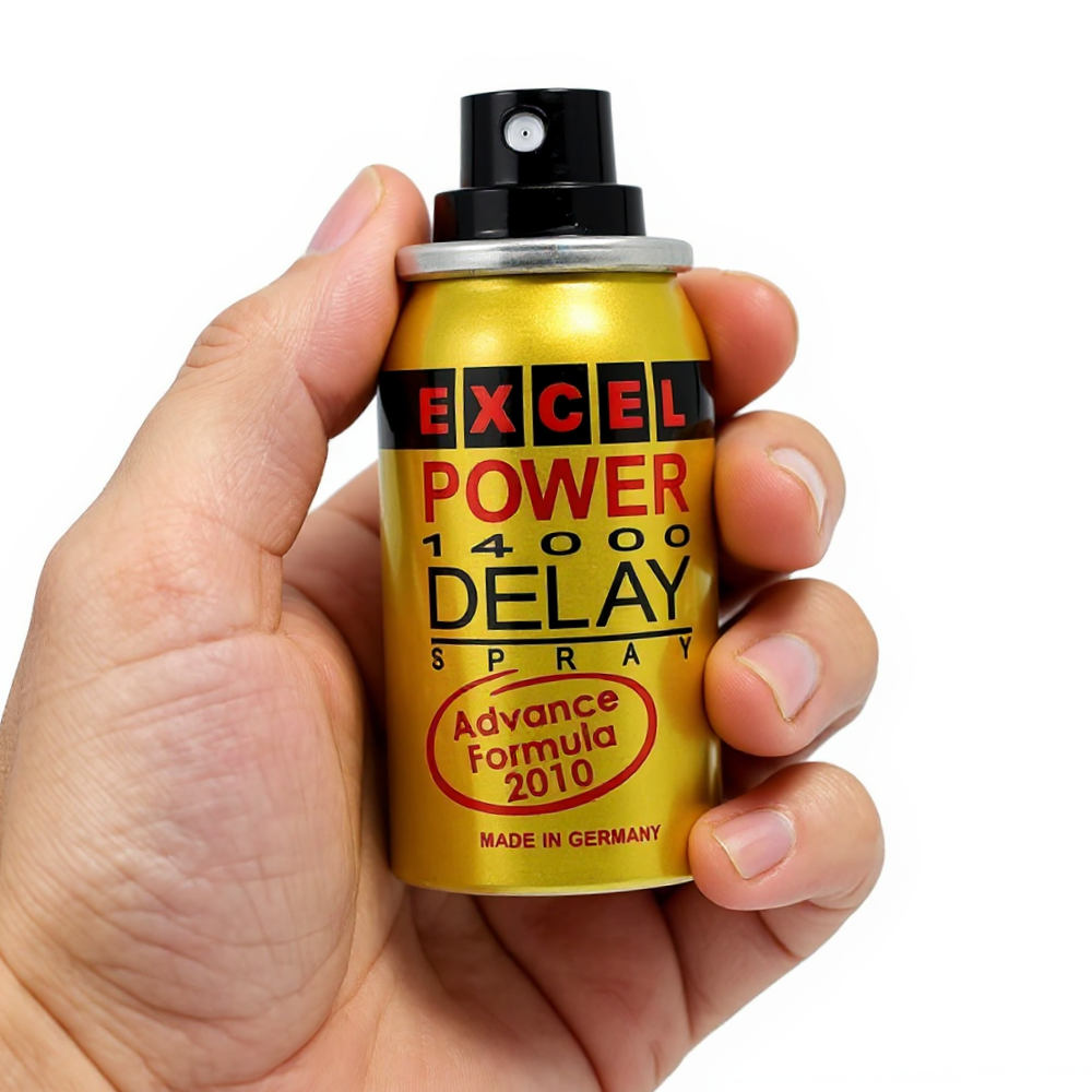 Excel Power 14000 Delay Spray gold can with Advance Formula 2010 label held in hand