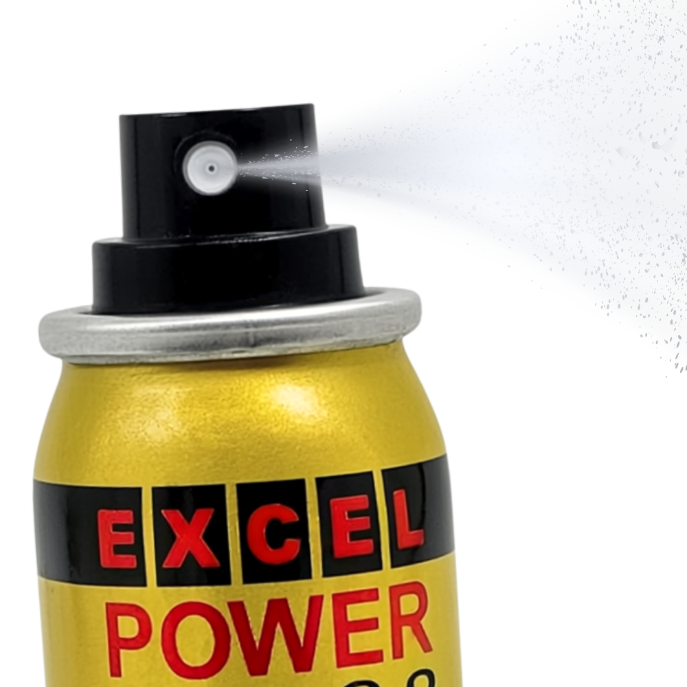 Excel Power 14000 Delay Spray close-up with nozzle spraying mist, gold can with red and black label