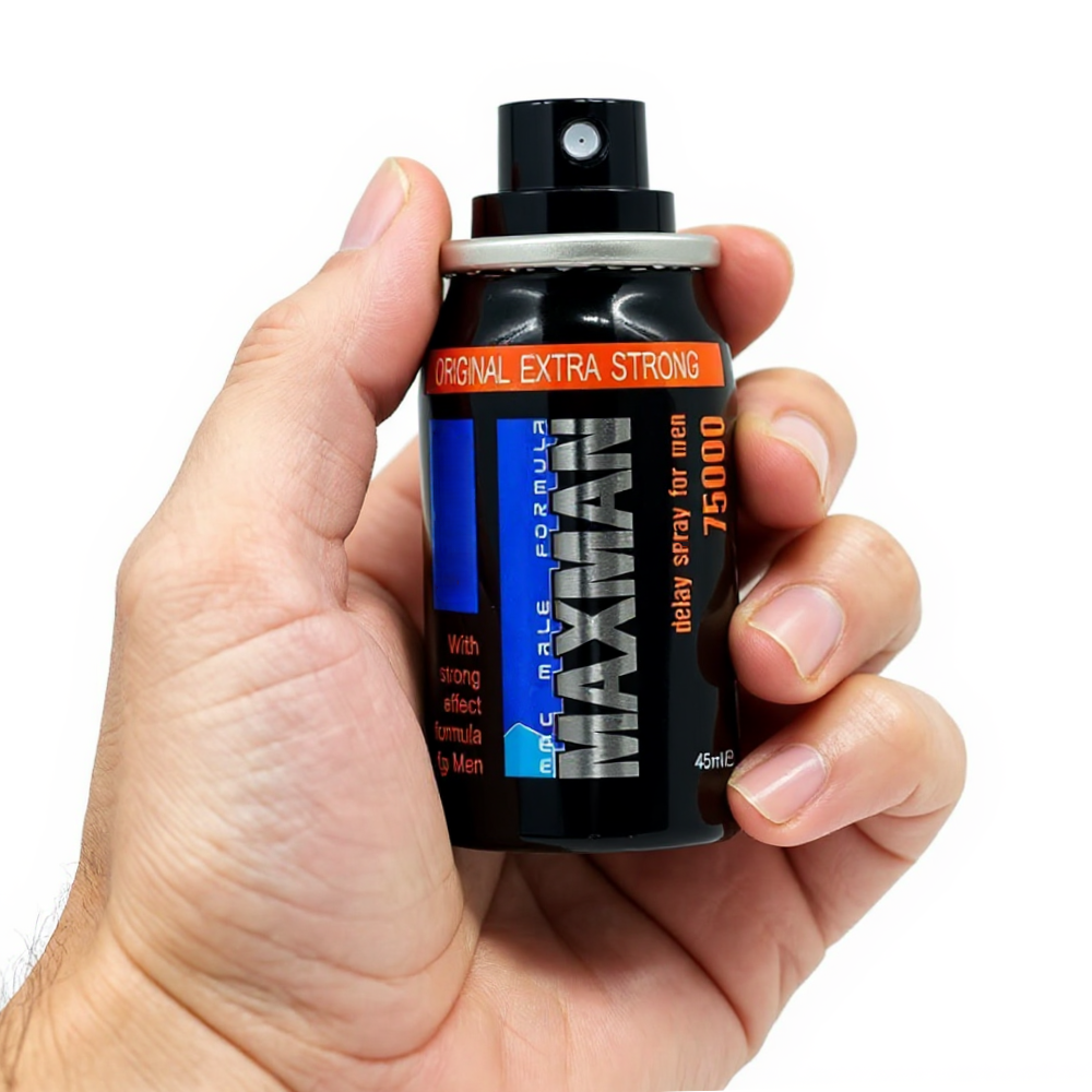 Maxman 75000 Delay Spray Extra Strong, black 45ml bottle held in hand