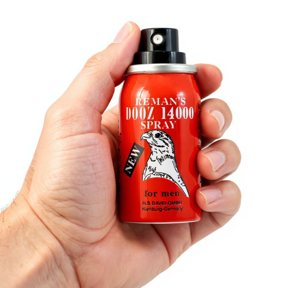 Reman’s Dooz 14000 Delay Spray red can with falcon logo held in hand