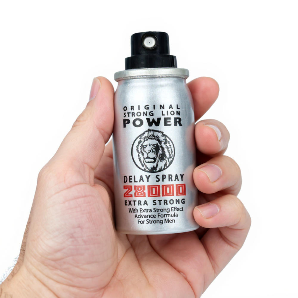 Strong Lion Power 28000 Extra Strong Delay Spray, silver can with roaring lion logo held in hand