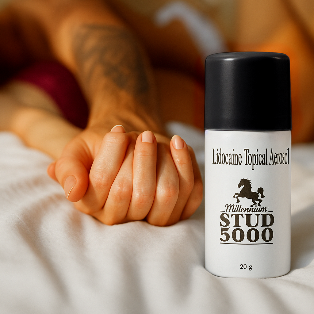 Stud 5000 lidocaine topical aerosol spray on bed, couple holding hands in background