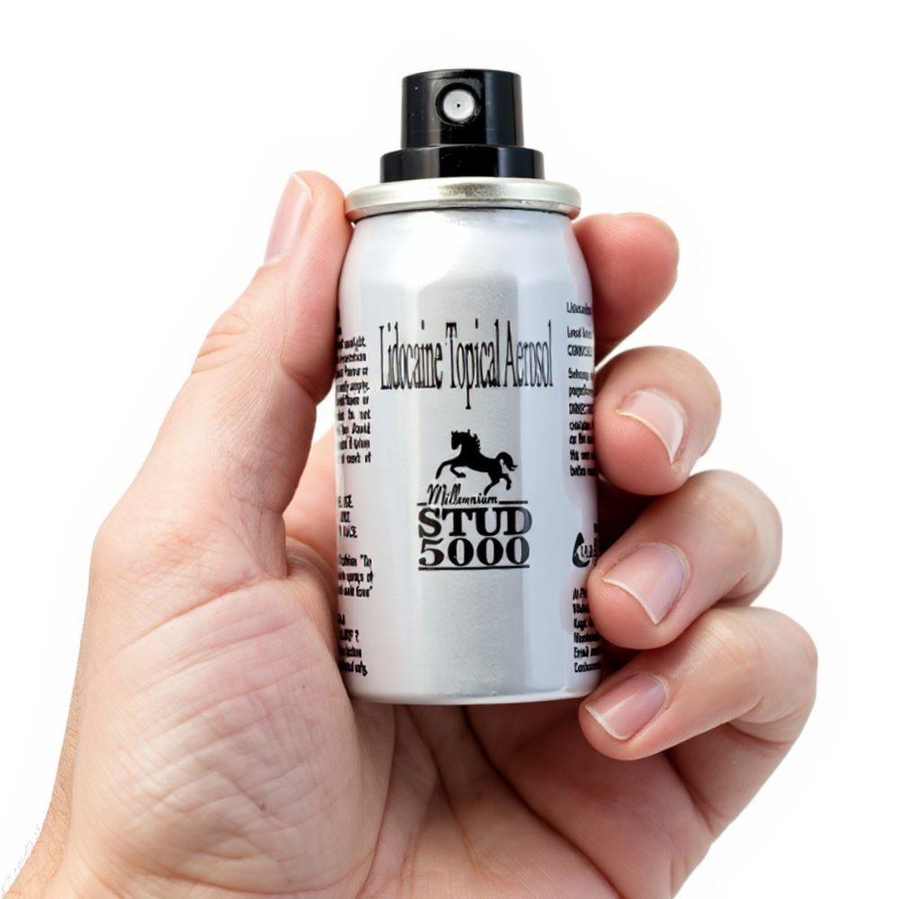 Millennium Stud 5000 Delay Spray, silver can with black horse logo held in hand