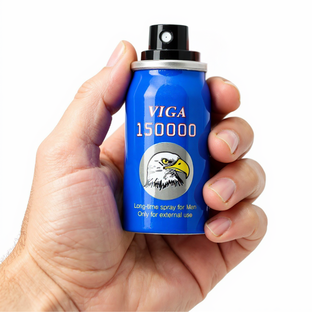 Super Viga 150000 Delay Spray blue can with eagle logo held in hand
