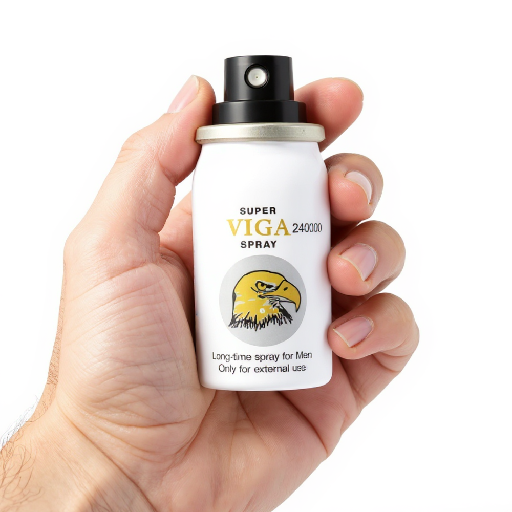 Super Viga 240000 Delay Spray, white can with yellow eagle logo held in hand