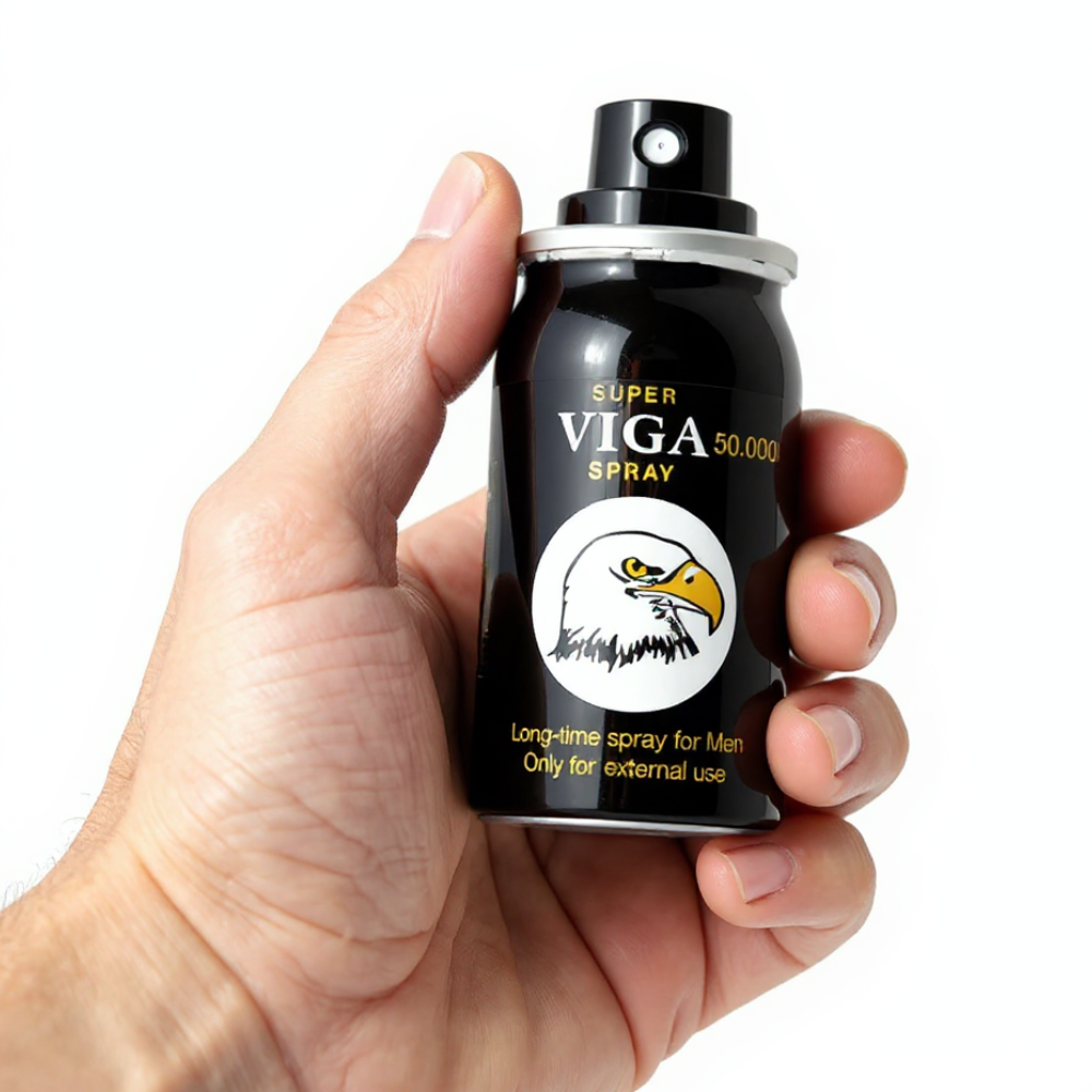 Super Viga 50000 Delay Spray, black 45ml can held in hand with eagle logo