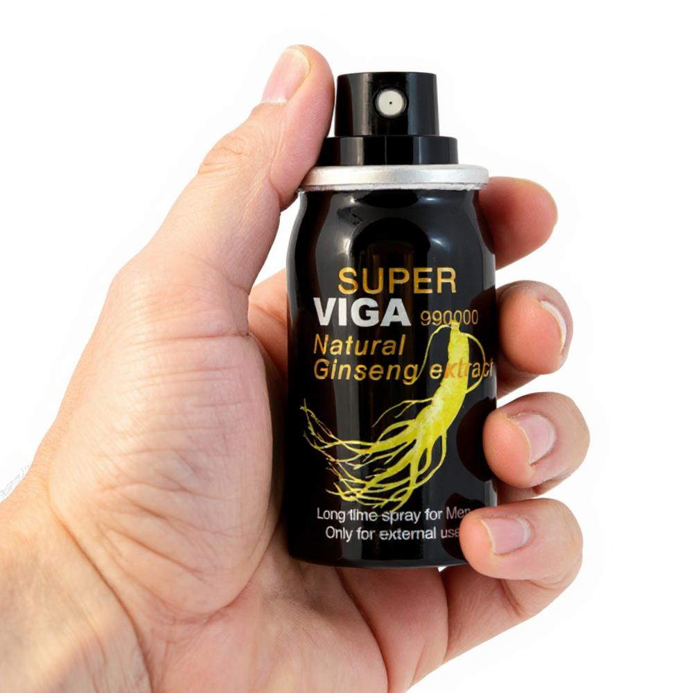 Super Viga 990000 Delay Spray with Natural Ginseng Extract, black bottle held in hand